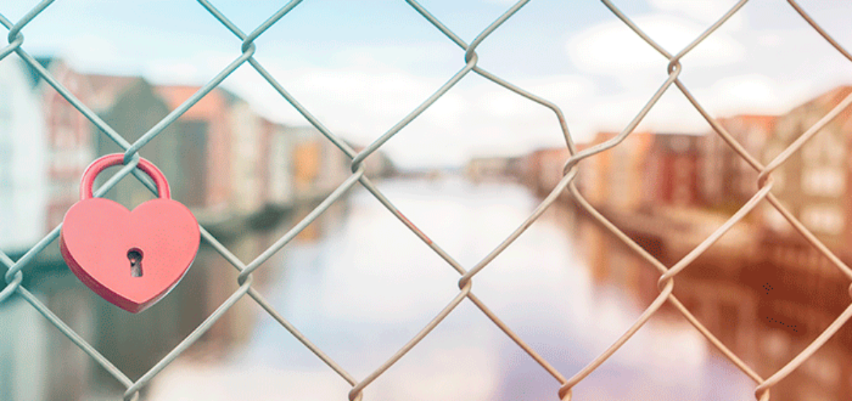 Heart shaped lock on a bridge