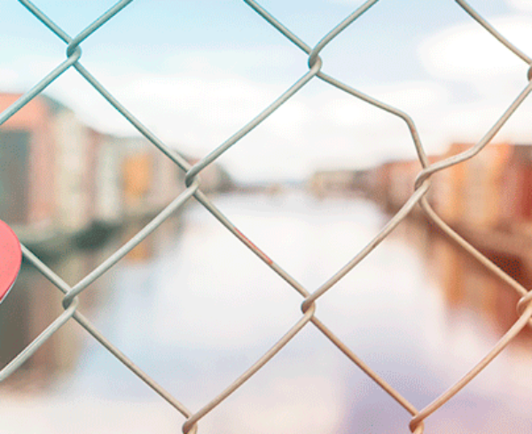 Heart shaped lock on a bridge