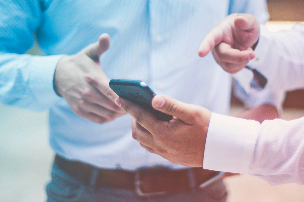 Business travelers using travel tech
