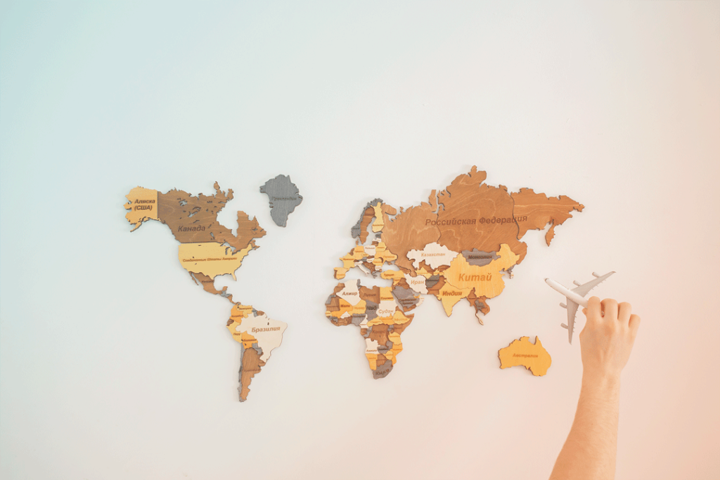 eSIM and international travel: Wooden map of the world.