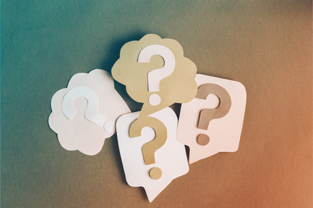 Cut-out paper question marks