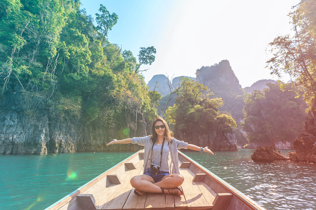 Woman sitting on a boat in the lake