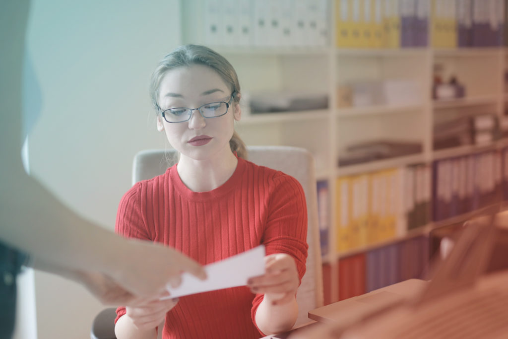 business women reviewing a draft of a travel policy