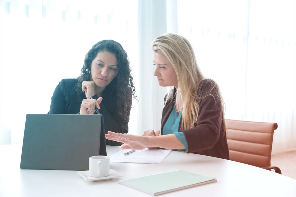 business women reviewing documents