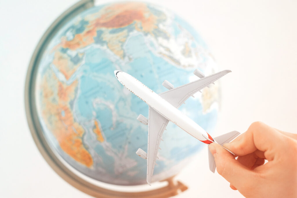 Globe and toy airplane
