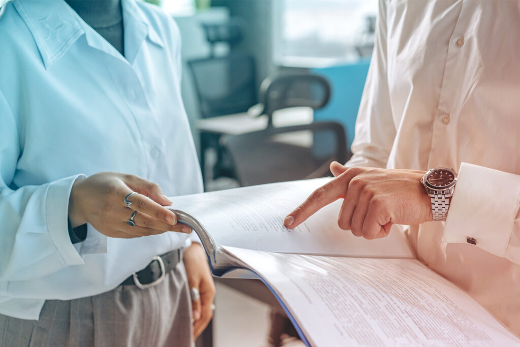 Business people reviewing documents