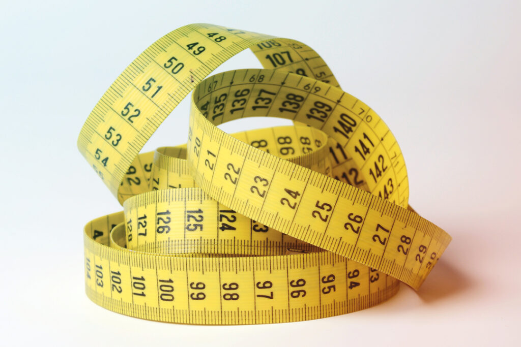 yellow tape measure - measuring the effectiveness of your business travel