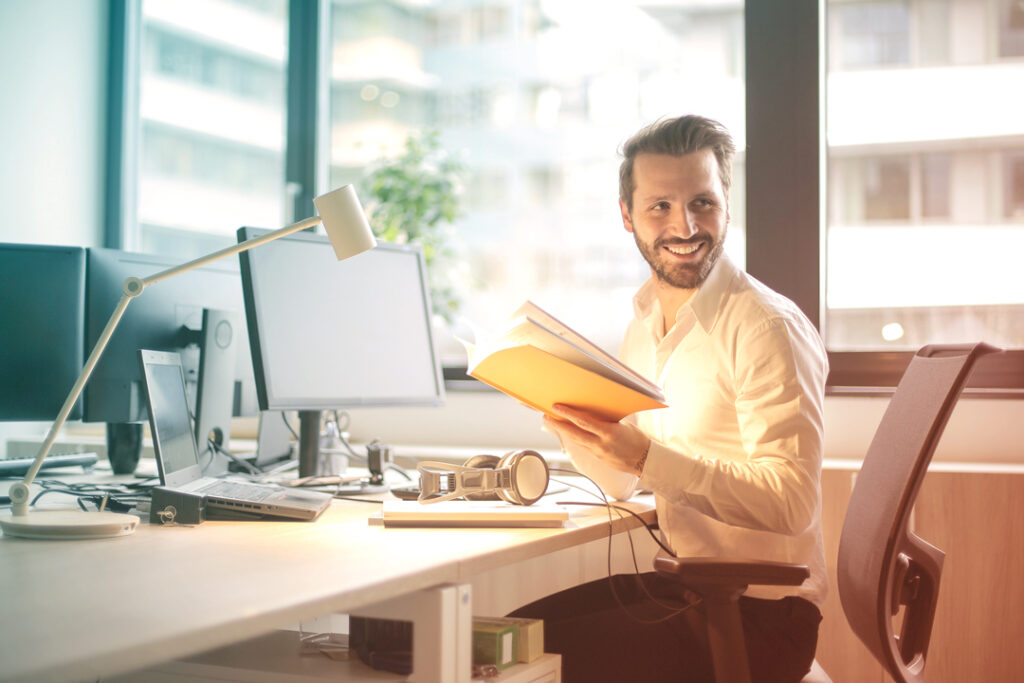 Happy employees at their desk