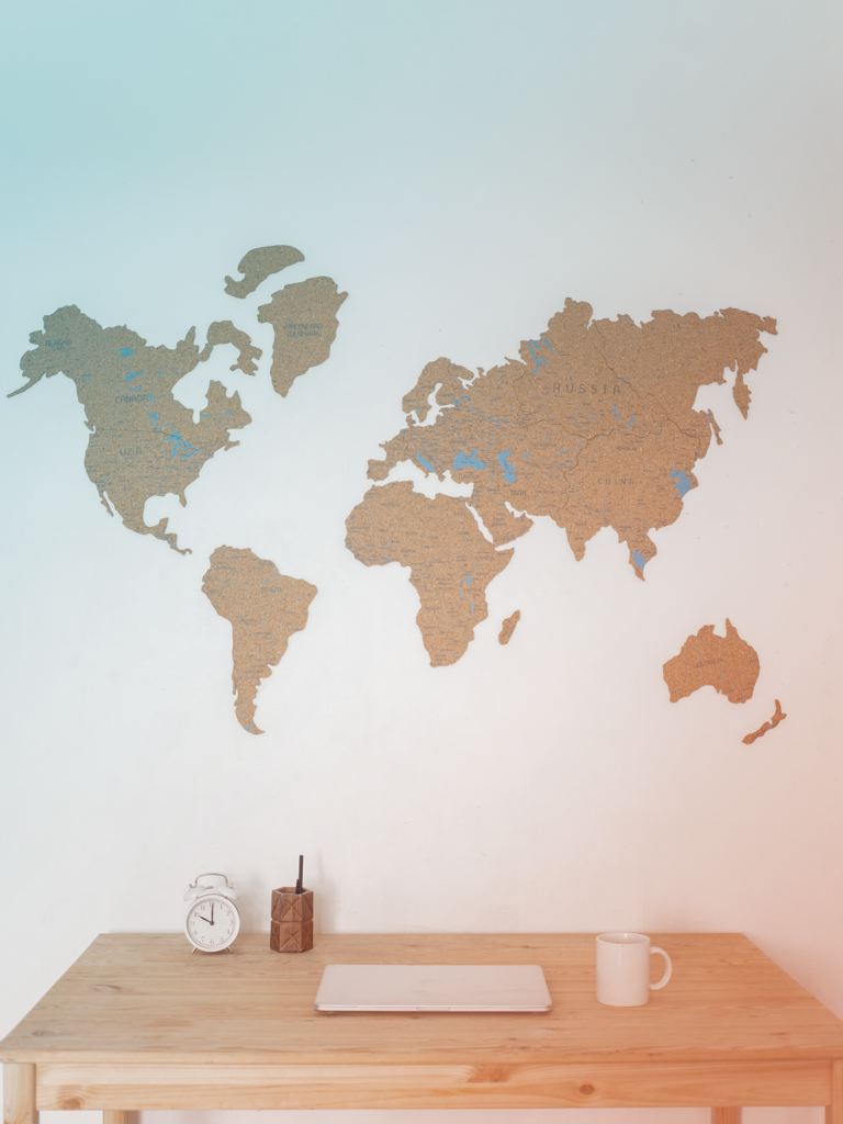Map of the world above a desk