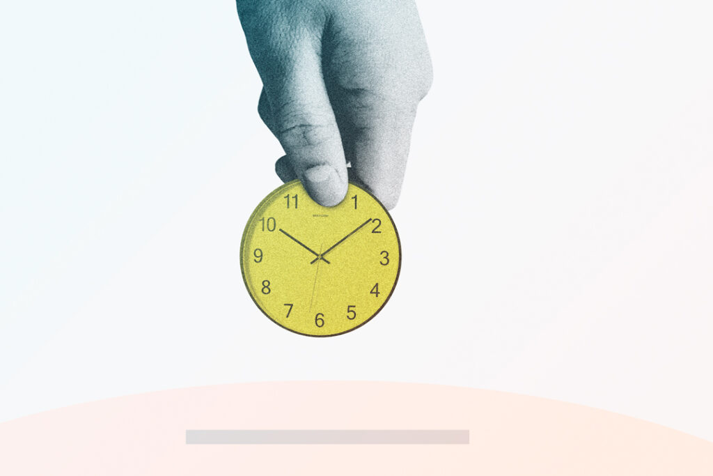 hand holding a clock - invest in business travel software