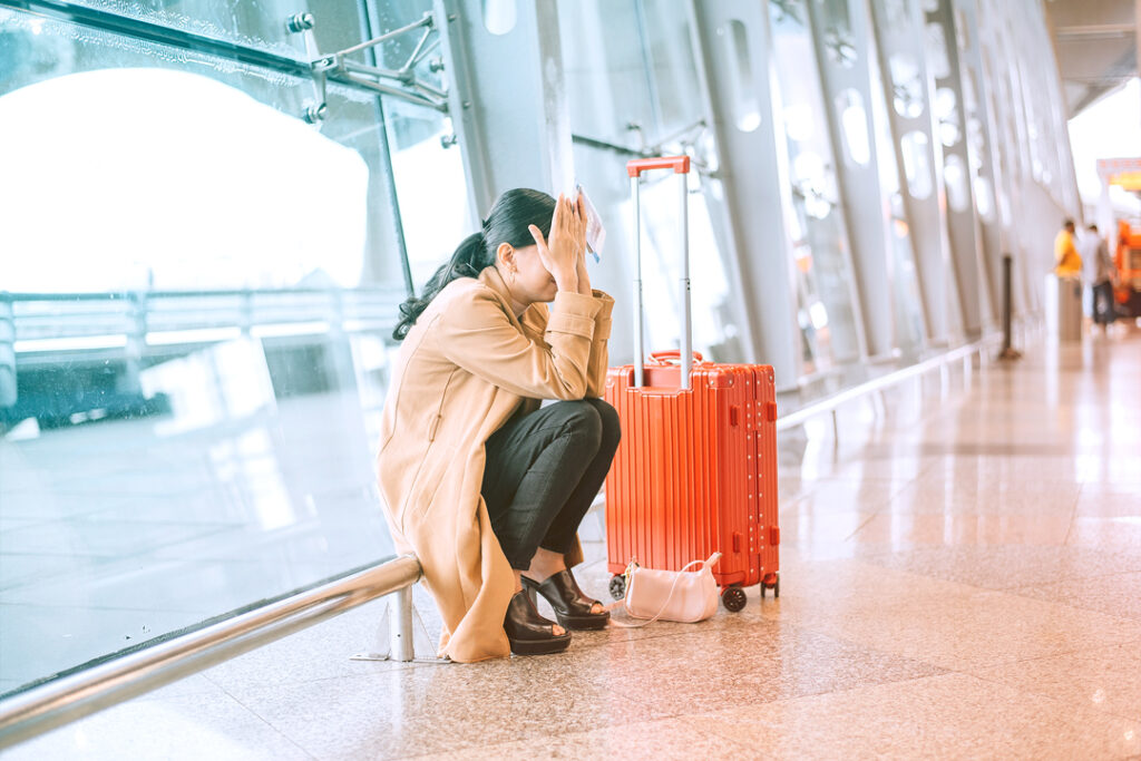 unhappy traveler in an airport