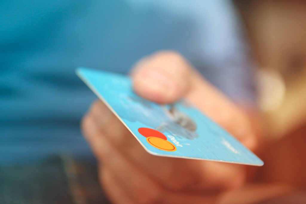 handing over a credit card