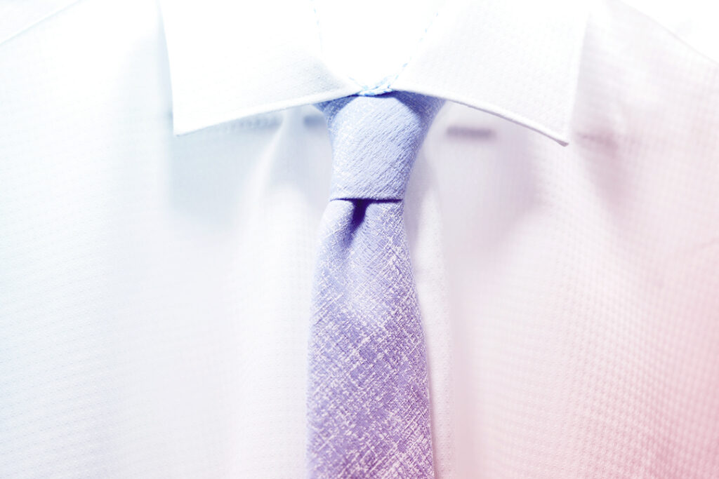 White shirt and blue tie