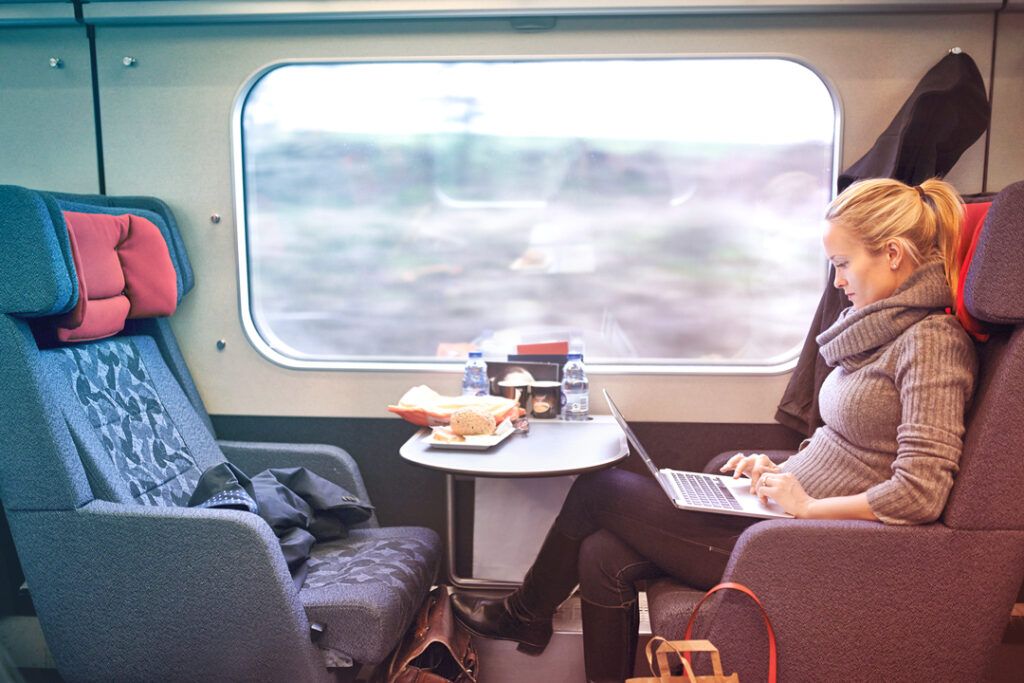 ground transportation trends - Working on a train
