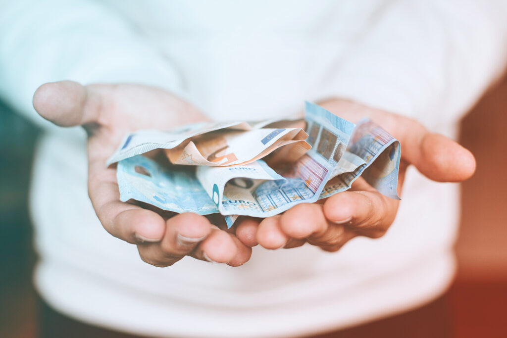 man holding cash