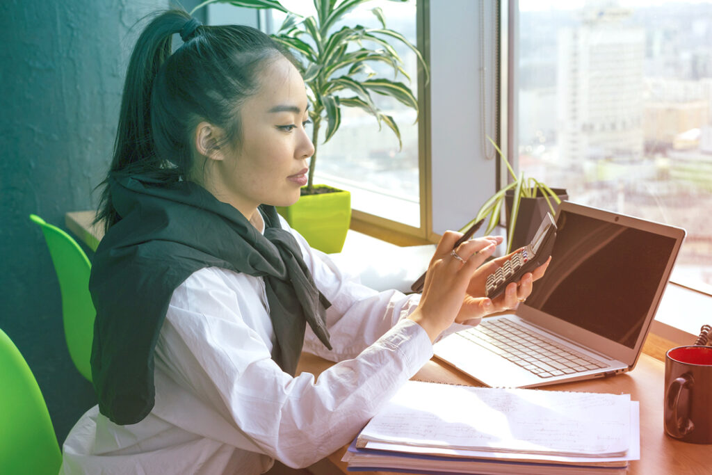 Employee using Calculator