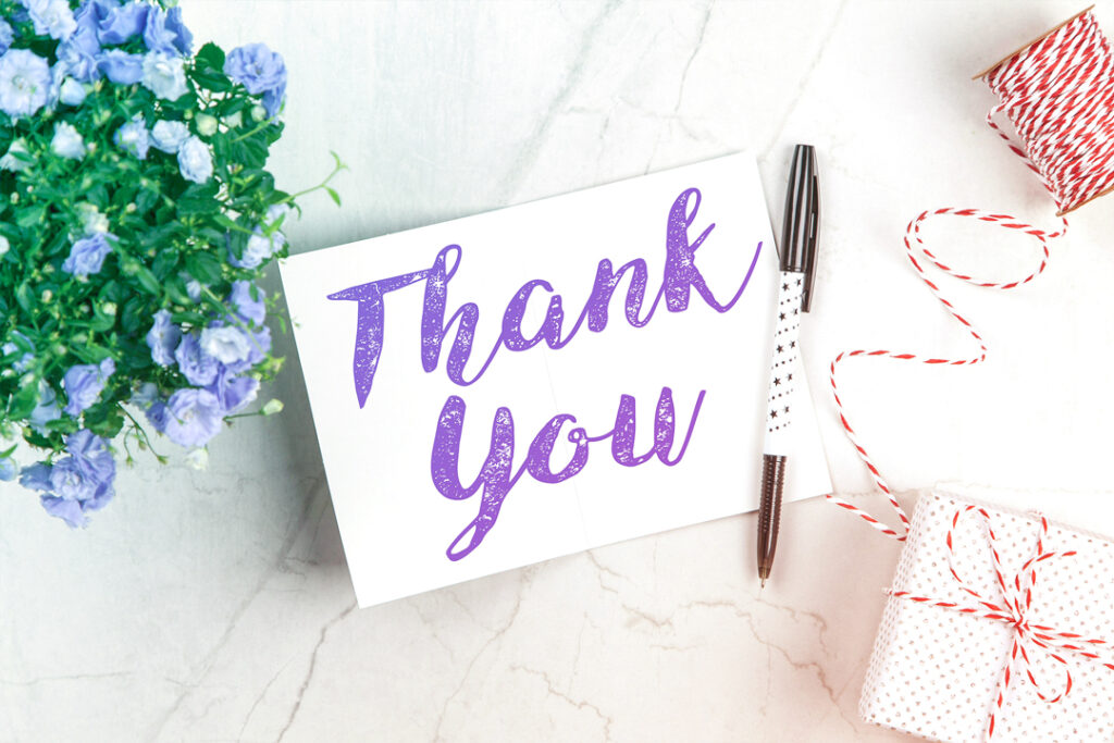 Image of a thank you card and gift box