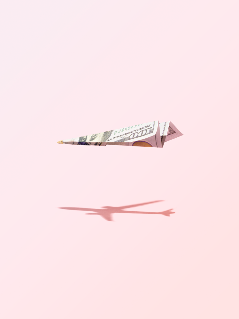 image of a Paper airplane made from a 100 dollar bill. Simplify travel and save money