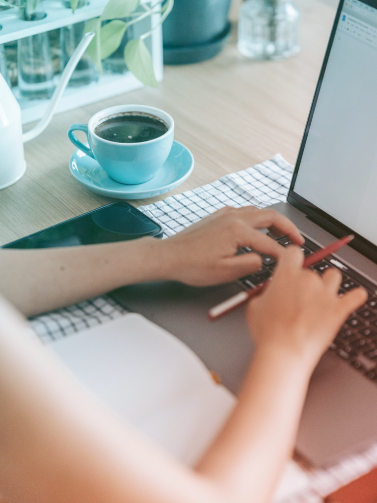 Image of a Business woman working on her laptop