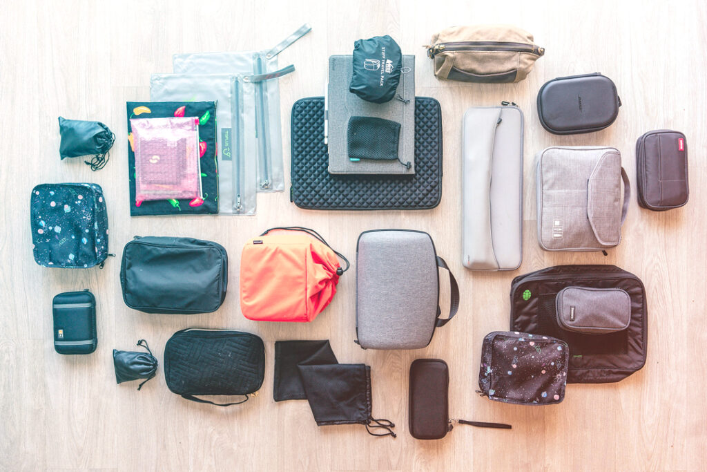 organized contents of sutcase on floor
