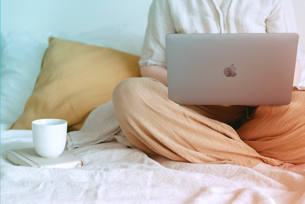 Image of a traveler, working from home in a relaxed setting