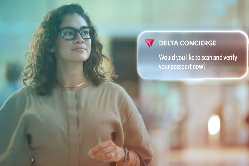 Image of a Traveler at the airport getting a Delta concierge alert
