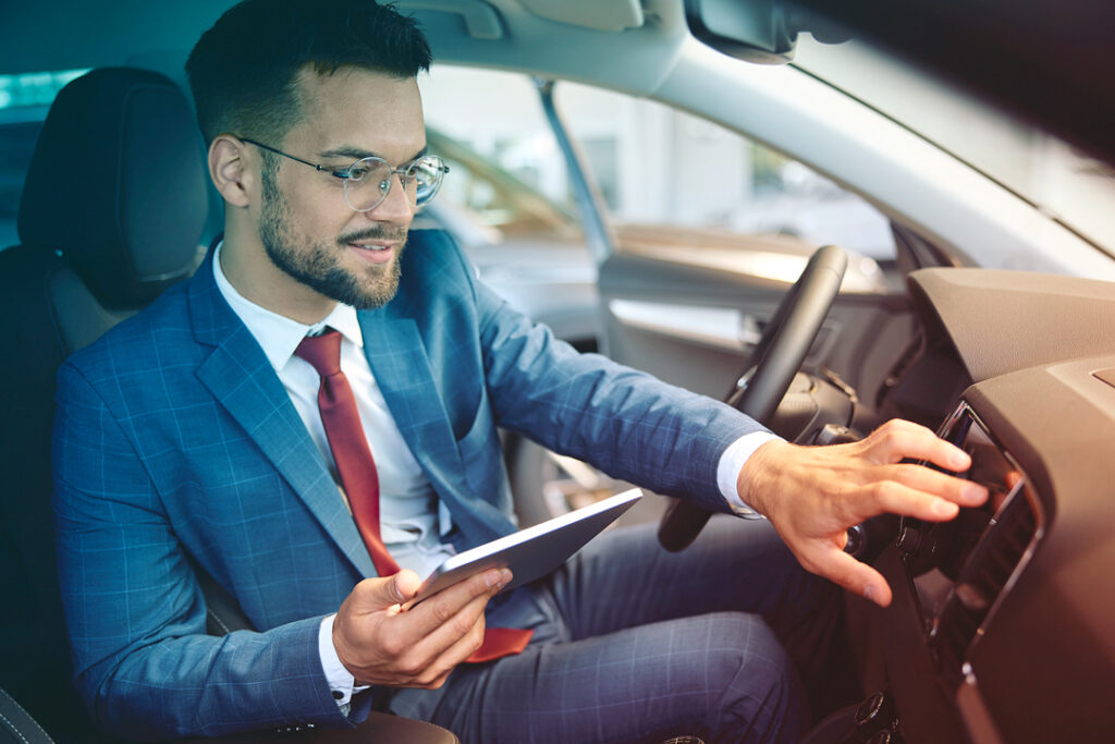 Traveler setting up thier rental car