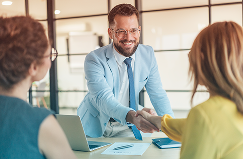 Business people shaking hands in the office