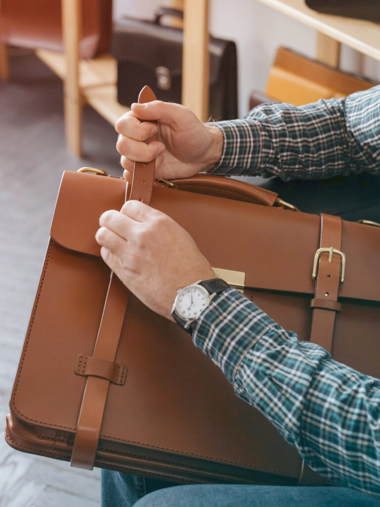 Traveler taking proper travel precautions with thier bag security