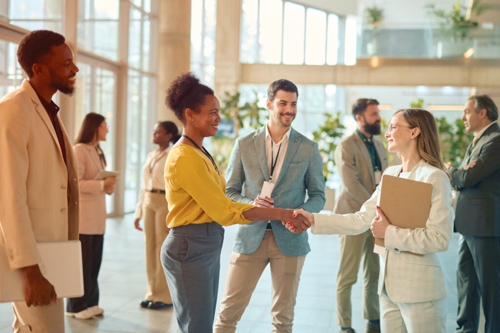 Travelers at a confrence networking