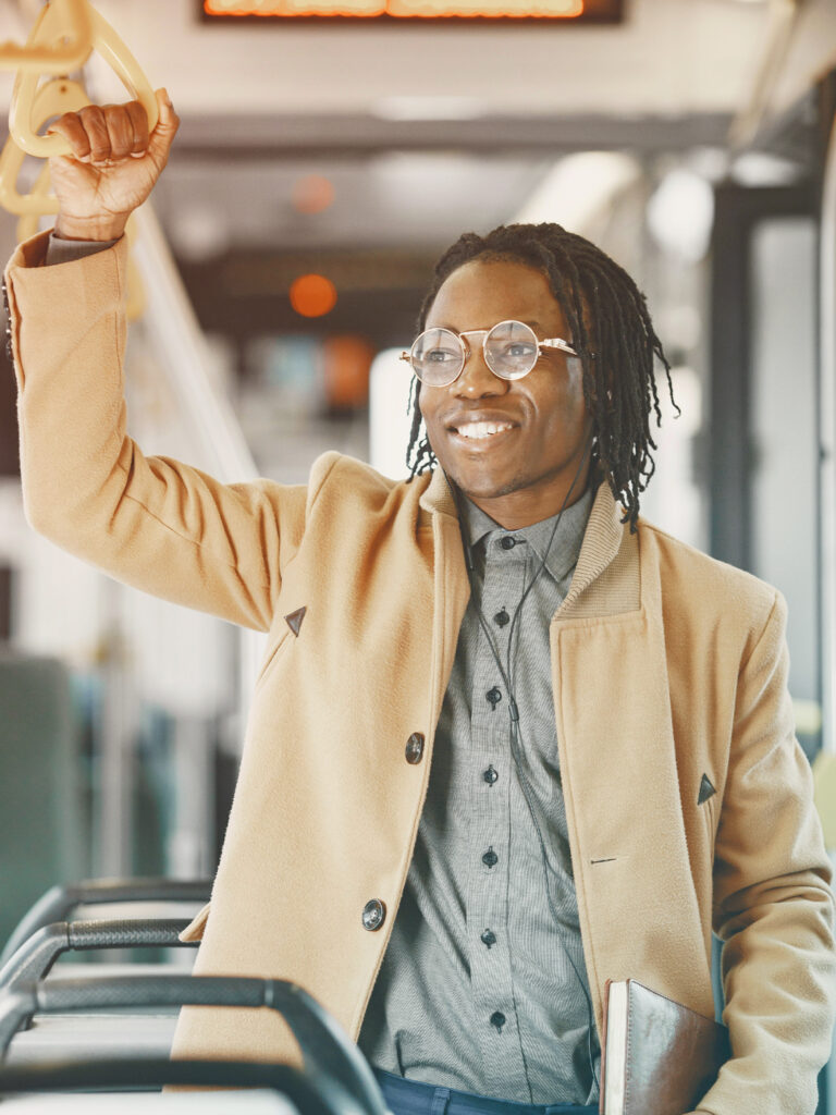 Traveler using public transportation safely