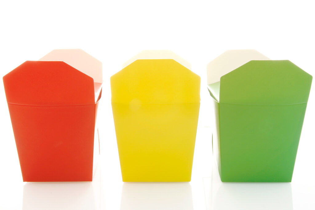 A red yellow and green takeout container