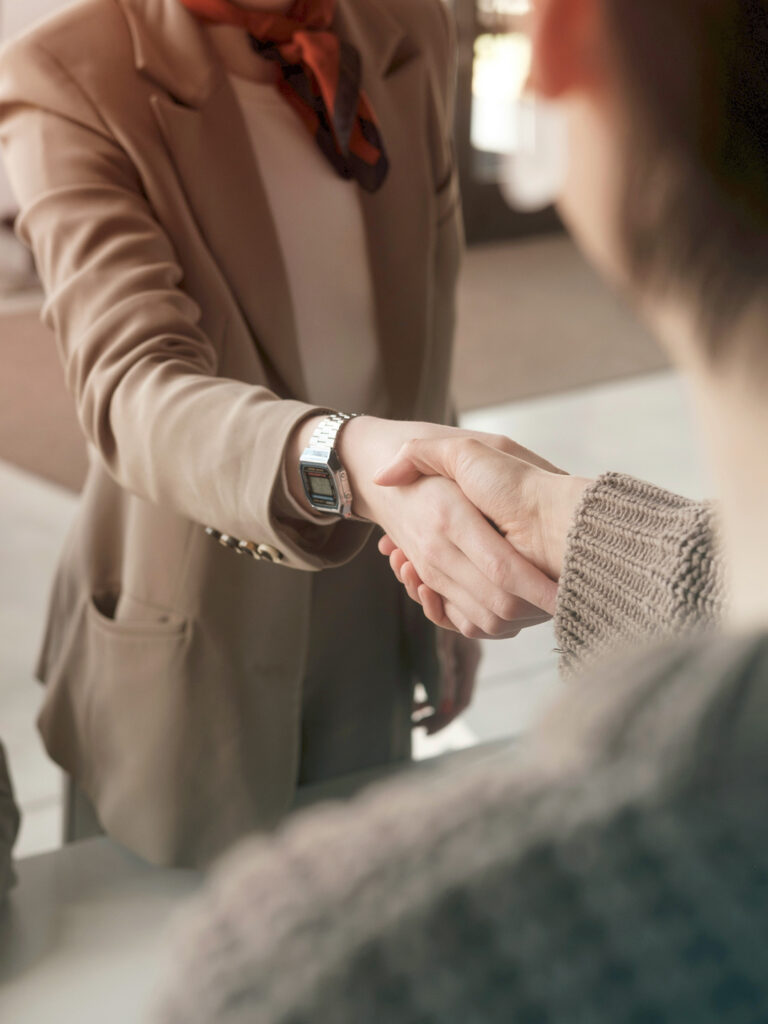 Two people shaking hands