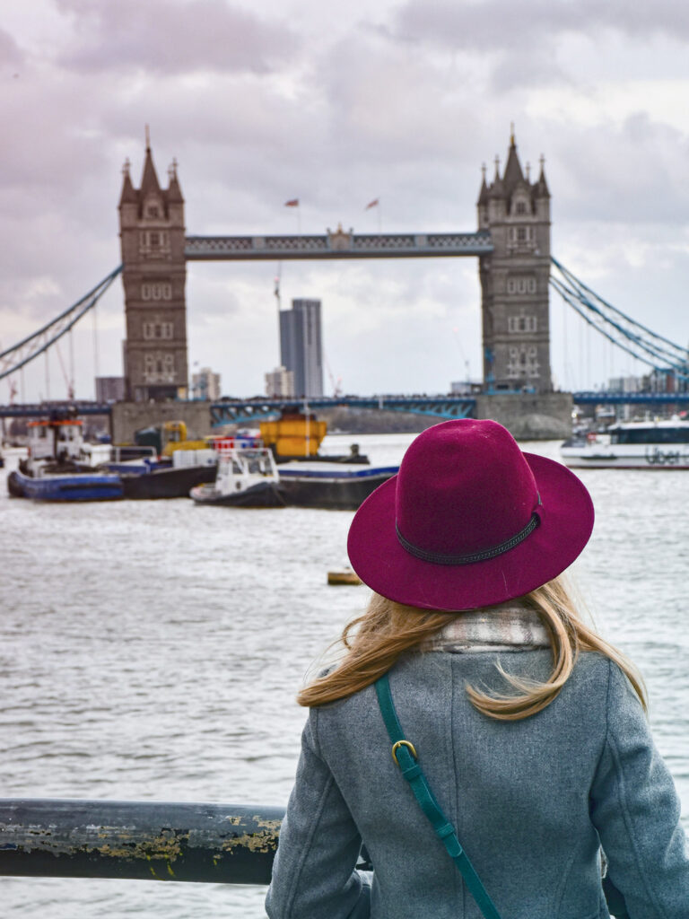 Traveler looking at the London Bridge