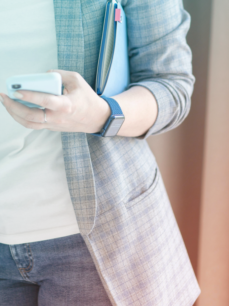 Checking a travel itinerary on a phone 