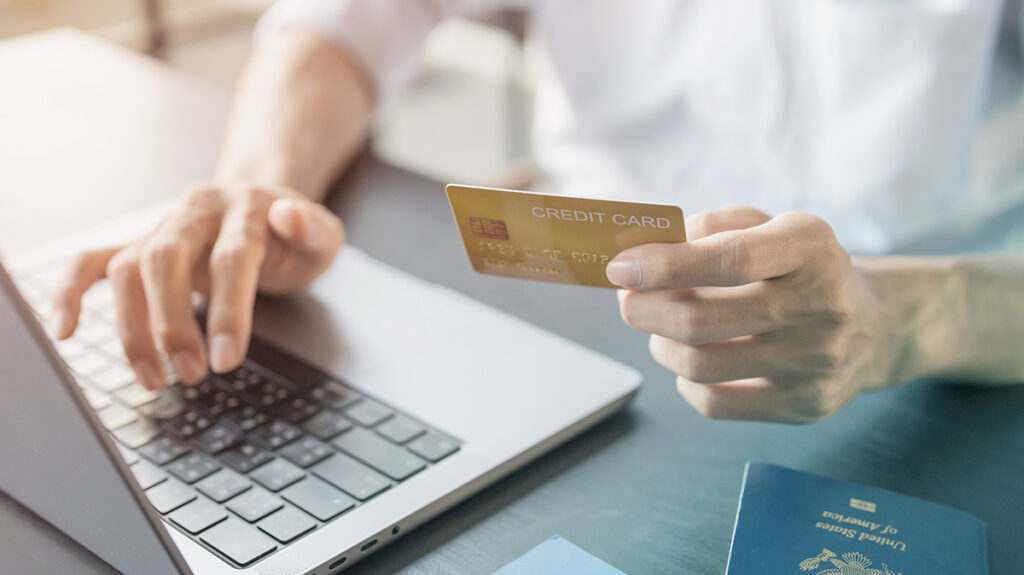 Traveler using a credit card to book airfare outside the booking tool