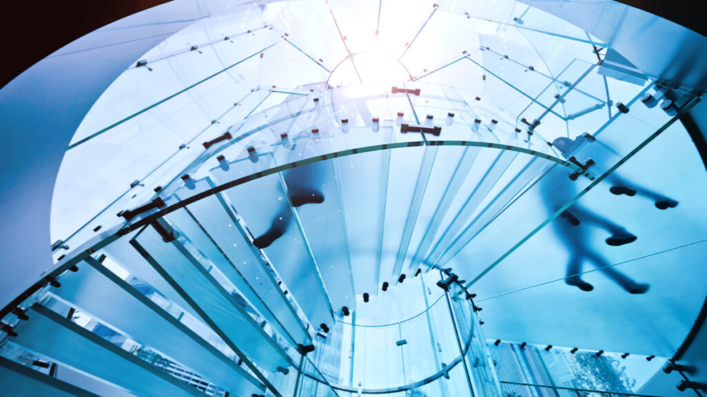 Translucent staircase with people walking on it